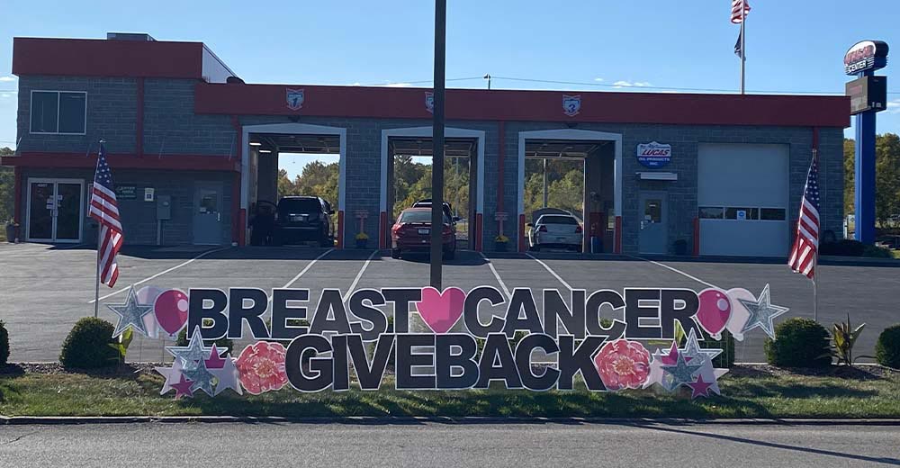 Breast Cancer Awareness Day sign in front of Lucas Oil Center at 4807 W. Lloyd Expressway, Evansville, provided by Sign Gypsies Evansville.